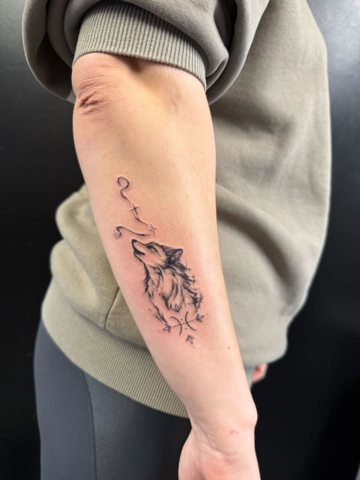 Howling wolf fine line tattoo